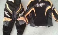 Womens Dirt Bike Pants, Size 8 and Jersey, Size M. Excellent condition. Sold as a set.