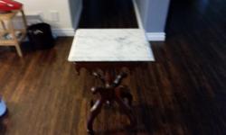 This small table {measures 29 inches high, and 18 inches by 24 inches in width and length} is in great shape, EXCEPT for the removable Italian marble top ~ there's a chip off one corner.
I am asking $100, but best offer will be considered!