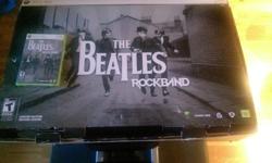 Limited edition BEATLES ROCKBAND with game. Hardly used due to small space. Great fun if your a true Beatles fan and great collectors item.