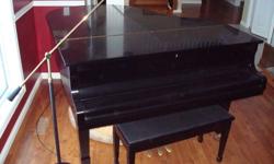Yamaha G2 Grand Piano black in color. tuned yearly and barely used.