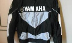Yamaha Textile Motorcycle Jacket
 
- Black and Grey
- Zip out liner
- Like new condition
- Size XL, fits like a large.  I'm 190lbs 5' 9" fits me good.
- Body Armor Inside Jacket
- $100.00 OBO.
 
 613-328-4314