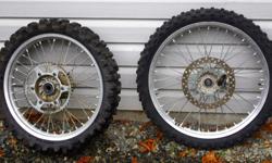 Pair of wheels off of my 2003 YZ450F, also fits similar years YZ125, 250, 250F, 400F, 426F, and WR. Good shape, includes spacers, sprocket, front rotor, tires are decent.
