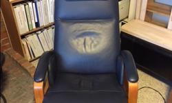 High end Zero Gravity Recliner/Back Chair in very good condition. Soft, dark blue, leather material with electronic angle adjustments for the seat. Great for people with back problems. Watch TV or read in comfort. These chairs sell for over $3,000 at the