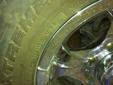 305-70-r-16 NITTO MUD GRAPPLERS ON 8 HOLE CORE RACING RIMS