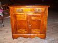 two antique cabinets